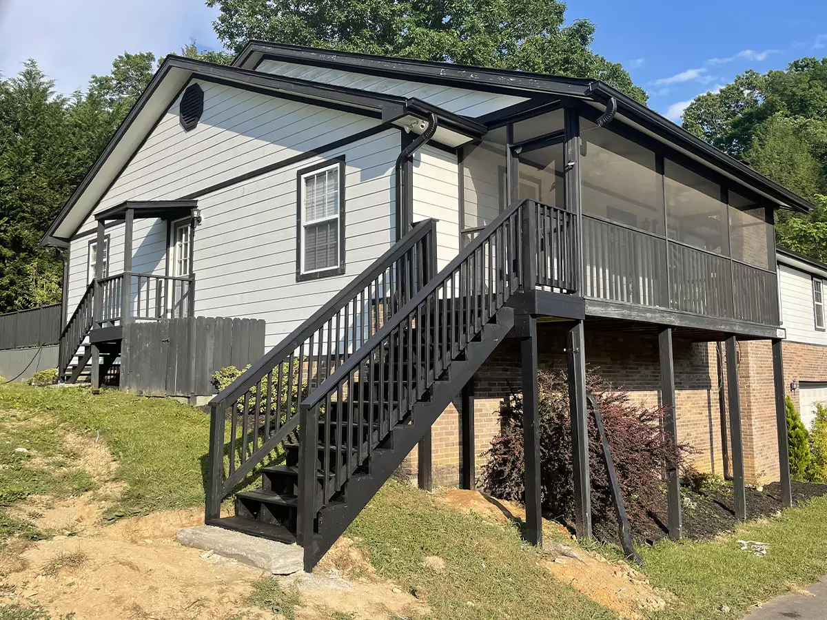 Extended screened-in deck with new stairs