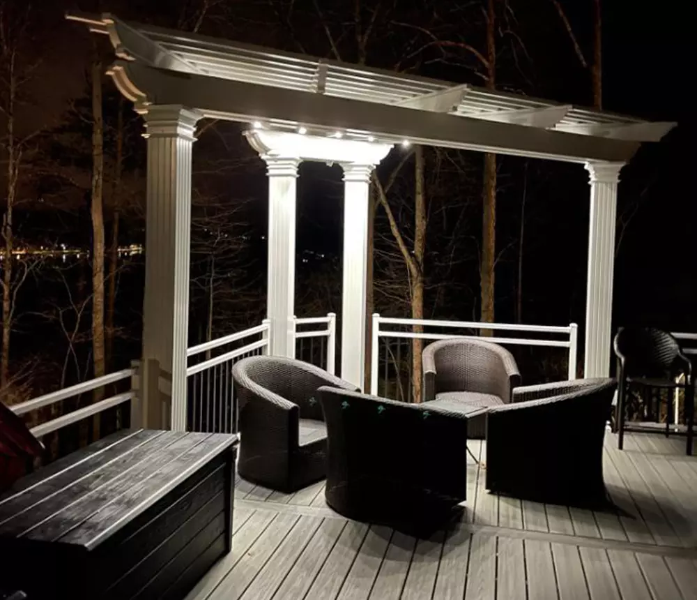 Deck build in Tennessee with pergola, sitting area, and built-in lighting