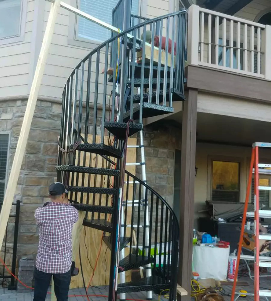 Member of the Riverview Decks crew working on a deck building project in Tennesee